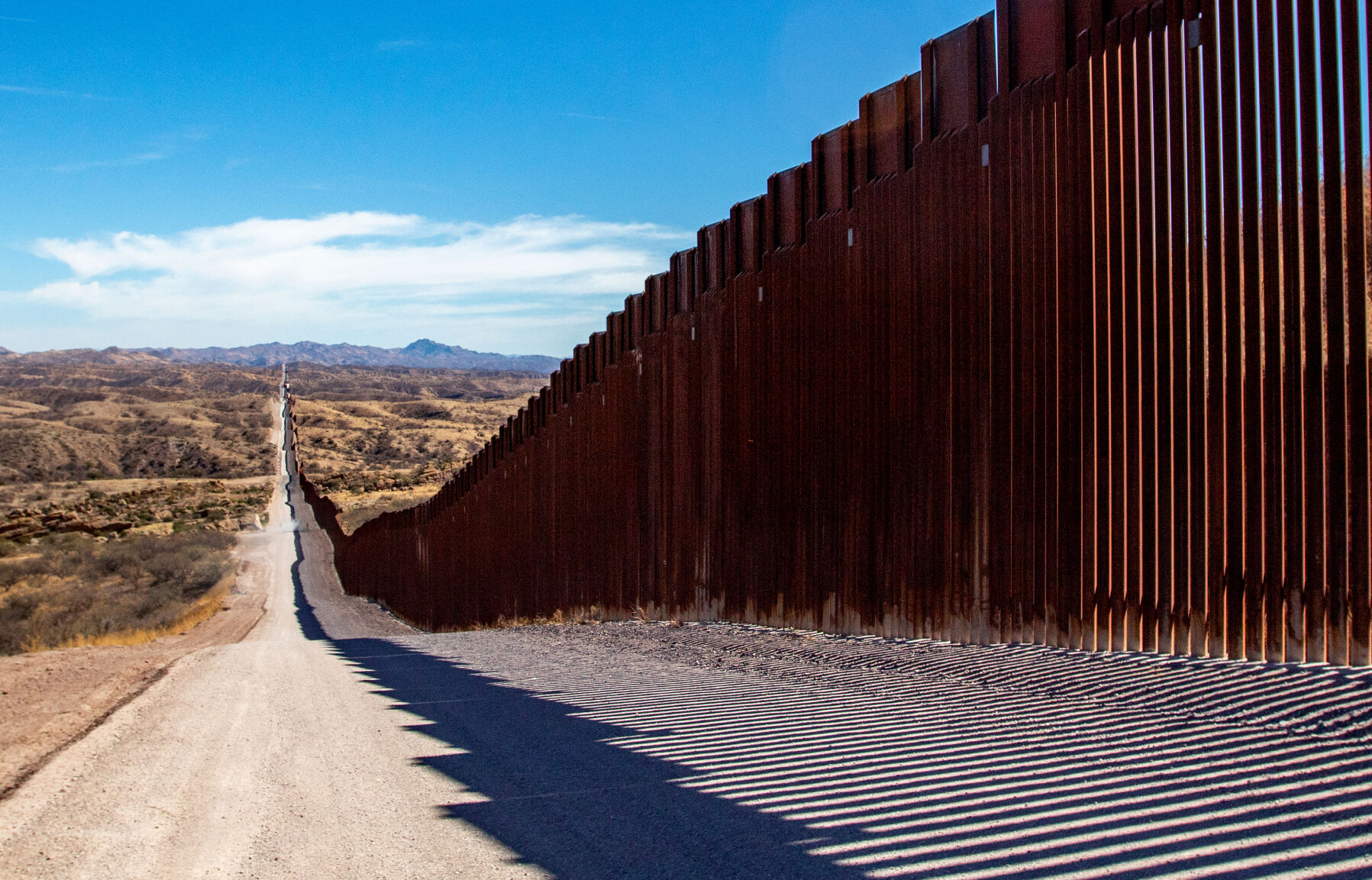 Noem: Trump wants border wall painted black to deter climbing it